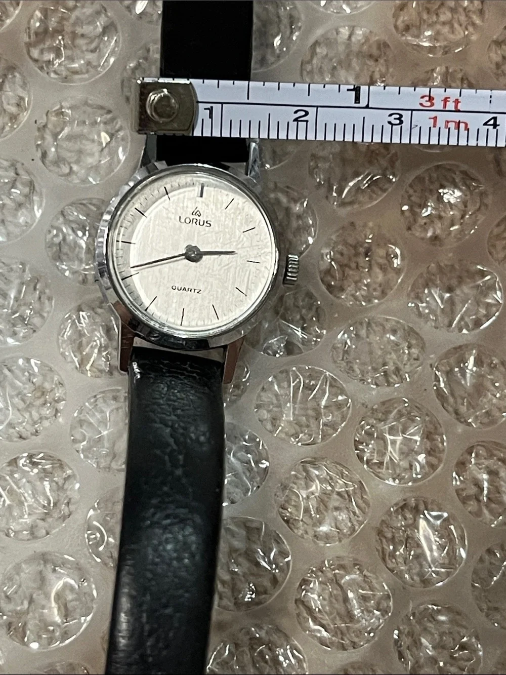 Women's Silver Dial Watch with Black Leather Strap